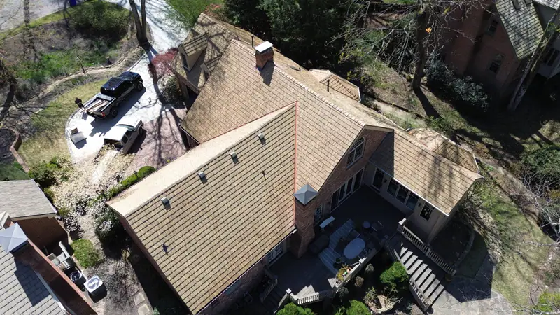 After: Brava synthetic cedar shake roof replacement on a brick home in North Georgia